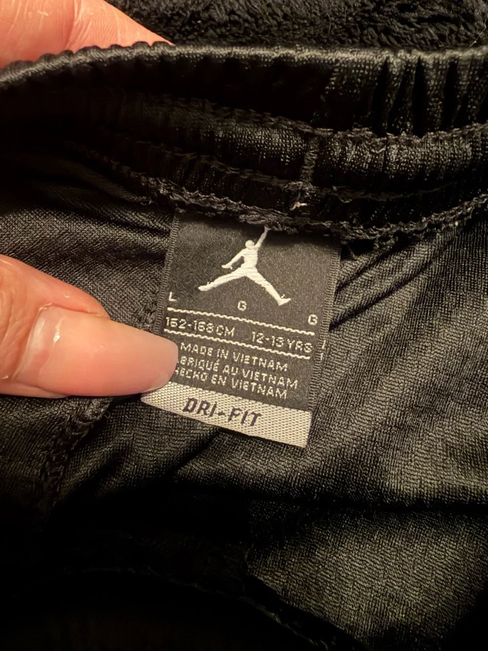 Jordan Black Athletic Mesh Shorts with Logo Hem